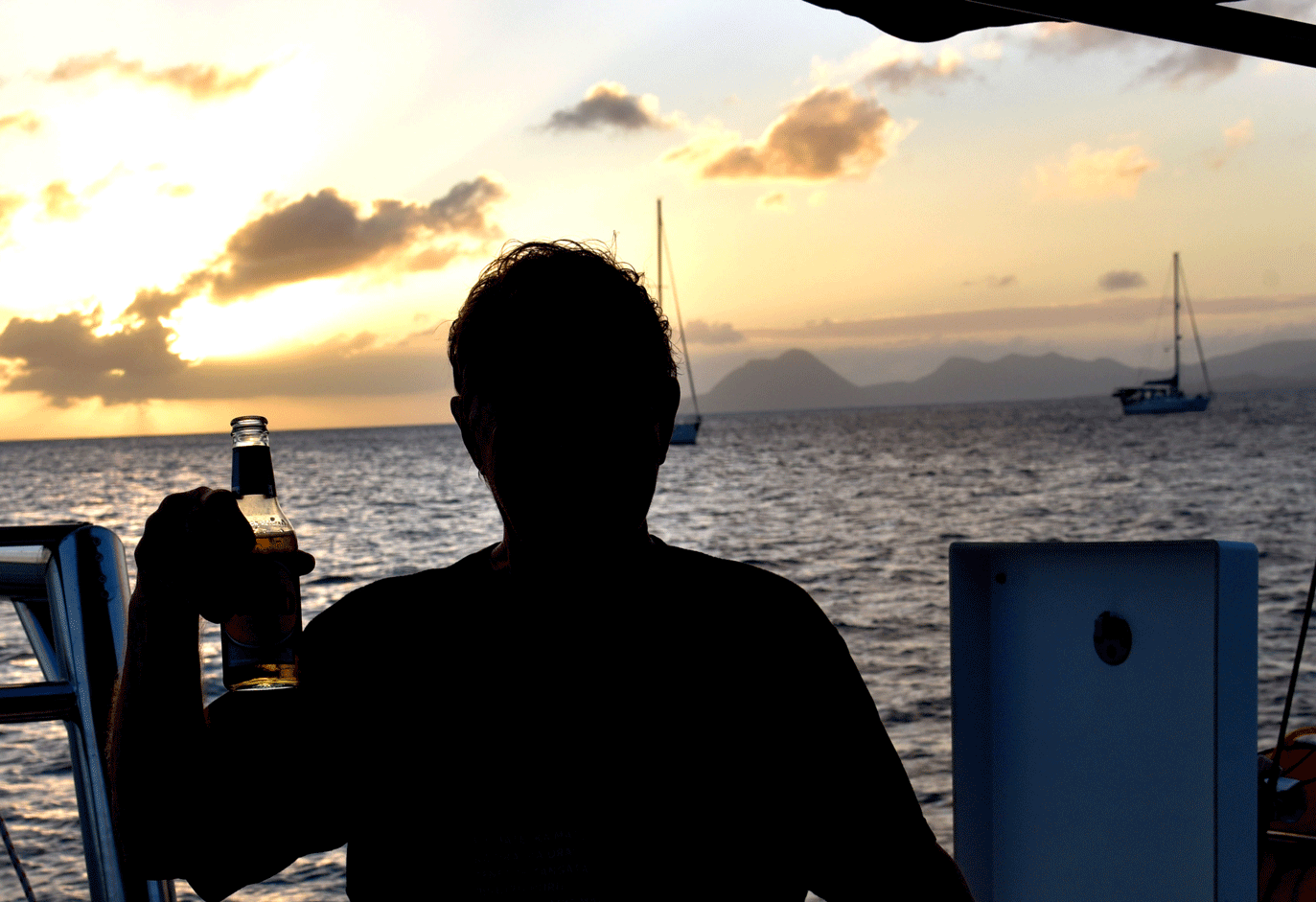 Beer in cockpit at sunset